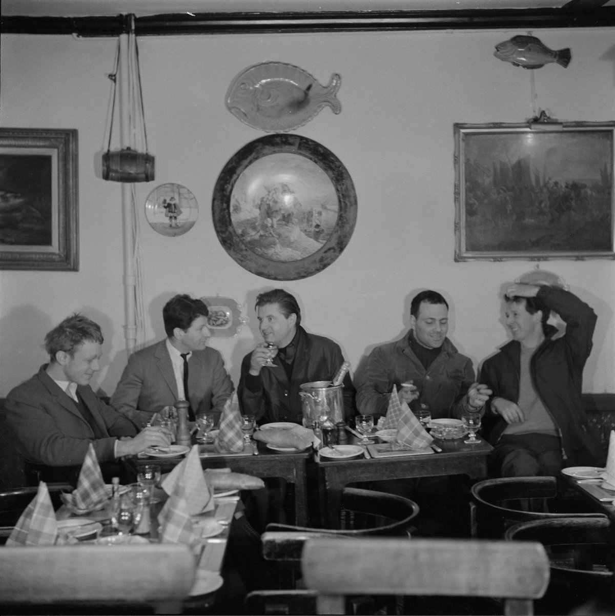 John Deakin, Group portrait of painters (left to right) Timothy Behrens, Lucian Freud, Francis Bacon, Frank Auerbach and Michael Andrews at Wheelers Restaurant in Soho, London, 1963